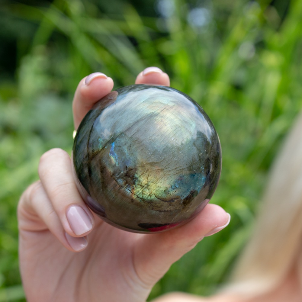 https://shop.thecrystalcouncil.com/wp-content/uploads/2019/08/labradorite-sphere-1000px.jpg